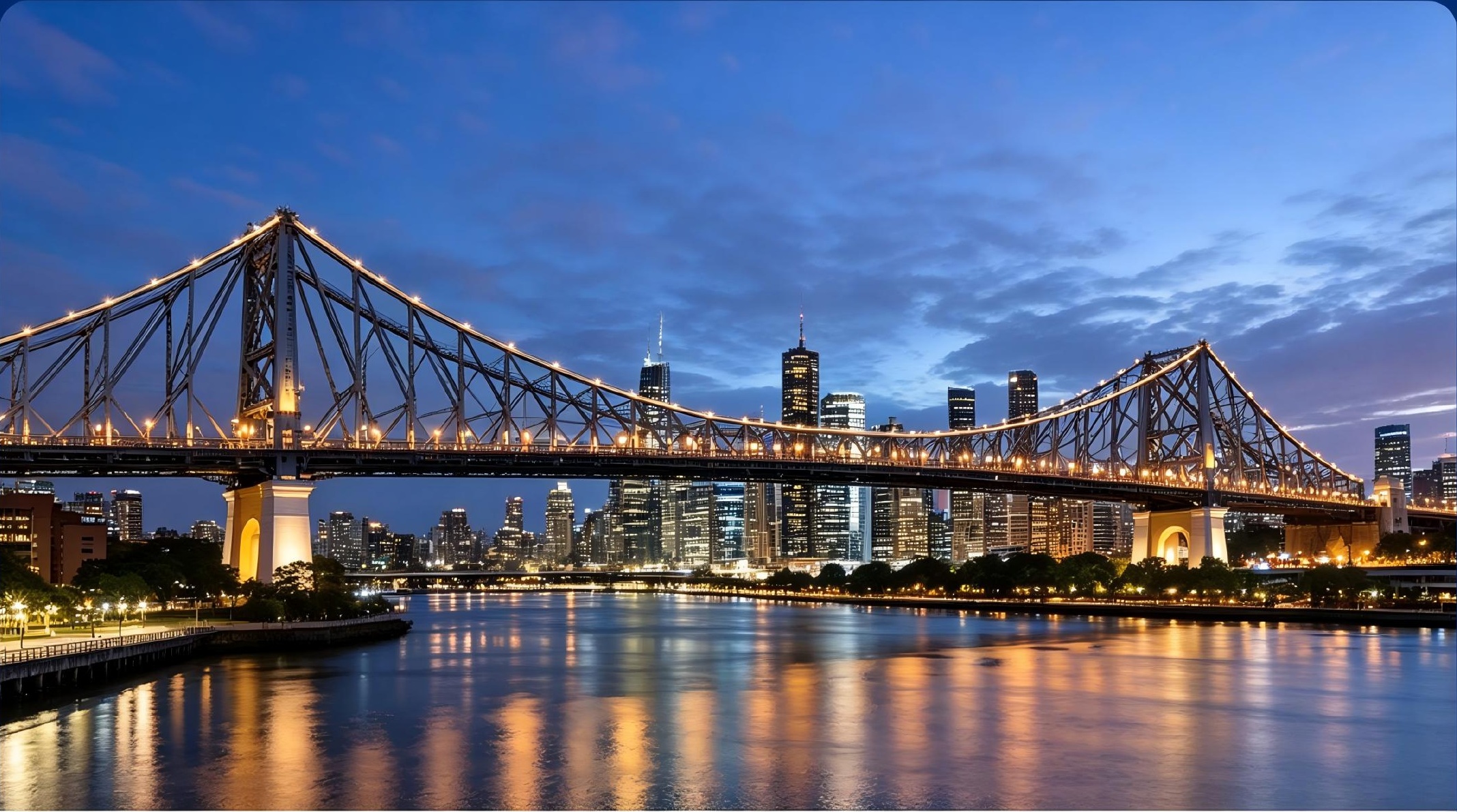 Brisbane skyline and Story Bridge illuminated at dusk
